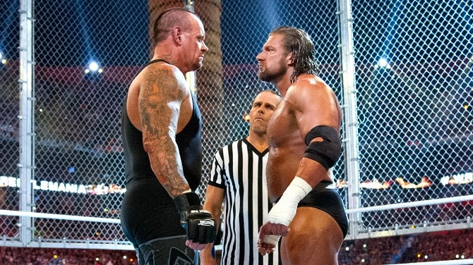 Triple H and Undertaker inside Hell in a Cell.